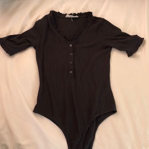 Black body suit, size small, from Downeast, button front with ruffled neck
